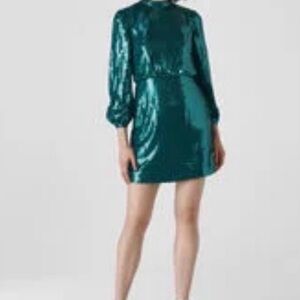 Beautiful Whistles green sequined holiday dress.